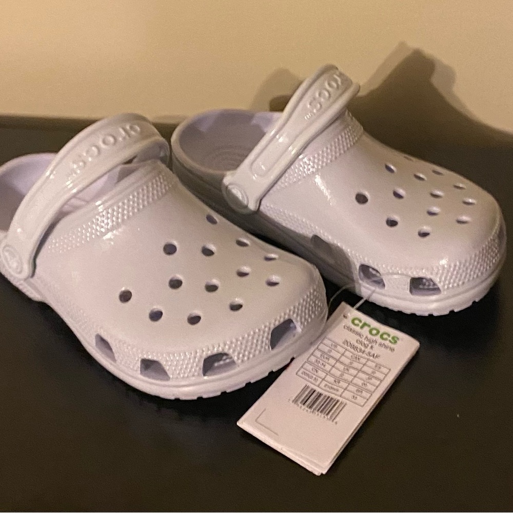CROCS White Sandals with Perforated Design and Pivoting Heel Strap